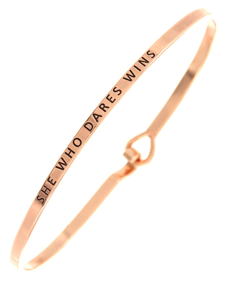 SHE WHO DARES WINS